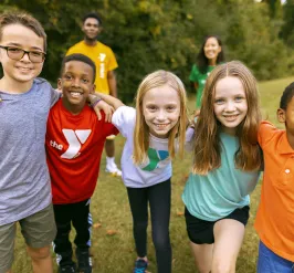 group of kids outside on field